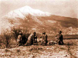The bombing of the Monastery at Cassino, as seen from the bank of the Rapido River, 15 February